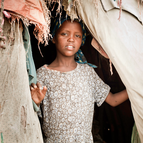 Youth In fabric doorway